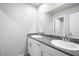 Modern bathroom featuring double vanity with granite countertop and contemporary fixtures at 3807 Andorian Ave, North Las Vegas, NV 89084