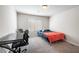This bedroom features neutral walls, carpet, and a large window at 3807 Andorian Ave, North Las Vegas, NV 89084