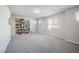 Bright bonus room offers ample space, plush carpeting, and plenty of natural light from multiple windows at 3807 Andorian Ave, North Las Vegas, NV 89084