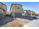 Charming two-story home boasts a two-car garage and neat front yard landscaping at 3807 Andorian Ave, North Las Vegas, NV 89084