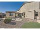 Backyard with neutral stucco and view of a small pond at 3892 Pasilla Ave, Las Vegas, NV 89118