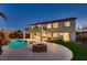 Outdoor living area with a sparkling pool, fire pit, and a spacious patio for entertaining at 3892 Pasilla Ave, Las Vegas, NV 89118