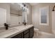 A modern bathroom featuring double sinks and stylish fixtures at 3892 Pasilla Ave, Las Vegas, NV 89118