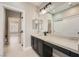 Modern bathroom featuring a large mirror, sleek vanity, and neutral color palette at 3892 Pasilla Ave, Las Vegas, NV 89118
