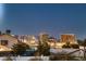 Stunning city skyline view with multiple buildings and blue sky at dusk at 3892 Pasilla Ave, Las Vegas, NV 89118