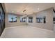 Stylish dining area with modern lighting and pool view at 3892 Pasilla Ave, Las Vegas, NV 89118