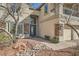 Inviting front entrance with stone accents, desert landscaping and brick walkway at 3892 Pasilla Ave, Las Vegas, NV 89118