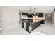 Spacious kitchen featuring a large island with stainless steel appliances and plenty of cabinet space at 3892 Pasilla Ave, Las Vegas, NV 89118