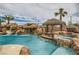 Spacious backyard with pool featuring a rock waterfall enhances the home's outdoor appeal at 3892 Pasilla Ave, Las Vegas, NV 89118