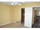 Bedroom featuring a sliding door closet, ceiling fan and access to the billiard room at 4047 Cougar Falls Ct, North Las Vegas, NV 89085