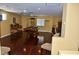 Spacious billiard room with hardwood floors, a pool table, and two ceiling fans at 4047 Cougar Falls Ct, North Las Vegas, NV 89085