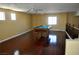Open billiard room featuring hardwood floors, a pool table, windows and recessed lighting at 4047 Cougar Falls Ct, North Las Vegas, NV 89085