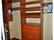 Custom wood shelving and drawers maximize storage in this well-organized closet at 4047 Cougar Falls Ct, North Las Vegas, NV 89085