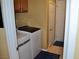 Laundry room with new machines at 4047 Cougar Falls Ct, North Las Vegas, NV 89085