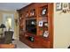 Living area with built-in shelving unit, and entertainment center at 4047 Cougar Falls Ct, North Las Vegas, NV 89085