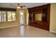 Bright living room with built-in shelving and backyard access at 4047 Cougar Falls Ct, North Las Vegas, NV 89085