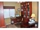 Home office boasts a built-in bookcase, desk area, and natural light at 4047 Cougar Falls Ct, North Las Vegas, NV 89085
