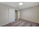 Clean bedroom with neutral paint, sliding closet door and carpet at 405 Frederick Ave, Las Vegas, NV 89106