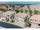 Aerial view of the home showcasing its architecture, balconies, and tile roof in a residential neighborhood at 4384 Grey Spencer Dr, Las Vegas, NV 89141