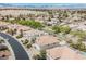 Community aerial view showing the neighborhood layout, landscaping, and mountain views in the distance at 4384 Grey Spencer Dr, Las Vegas, NV 89141