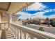 Balcony view featuring neighborhood with blue skies, manicured lawns and surrounding homes at 4384 Grey Spencer Dr, Las Vegas, NV 89141