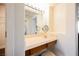 A bathroom vanity features makeup mirror and vanity lighting at 4384 Grey Spencer Dr, Las Vegas, NV 89141