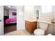 Bathroom with wood vanity and a view into the connected bedroom at 4384 Grey Spencer Dr, Las Vegas, NV 89141