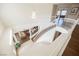 Bright foyer with chandelier, curved staircase, and views of the living area at 4384 Grey Spencer Dr, Las Vegas, NV 89141