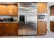 Kitchen featuring stainless steel appliances and custom cabinets at 4384 Grey Spencer Dr, Las Vegas, NV 89141