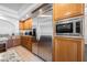 Spacious kitchen with stainless steel appliances and custom cabinets at 4384 Grey Spencer Dr, Las Vegas, NV 89141