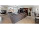 Spacious living room with fireplace, tv entertainment center, and light tile flooring at 4384 Grey Spencer Dr, Las Vegas, NV 89141