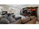 Open living room with a fireplace, tv entertainment center, and tile flooring at 4384 Grey Spencer Dr, Las Vegas, NV 89141