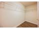 Empty walk-in closet with wire shelving and hardwood flooring at 4384 Grey Spencer Dr, Las Vegas, NV 89141