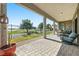 Covered patio featuring stone pavers and golf course views at 4772 Se Argent Hills Ave, Pahrump, NV 89061