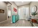 Welcoming entryway featuring modern decor, wood-look flooring, and lots of natural light at 4772 Se Argent Hills Ave, Pahrump, NV 89061