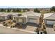 Beautiful single-story home boasts modern design and desert-friendly front yard landscaping at 4772 Se Argent Hills Ave, Pahrump, NV 89061