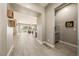 Hallway view of the spacious living area, showcasing the seamless flow and open concept design at 4772 Se Argent Hills Ave, Pahrump, NV 89061