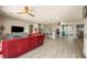 Spacious living room with open floor plan connecting to the modern kitchen at 4772 Se Argent Hills Ave, Pahrump, NV 89061