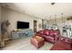 Open-concept living room and kitchen with modern decor and comfortable seating at 4772 Se Argent Hills Ave, Pahrump, NV 89061