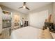 Main bedroom with wood flooring, and views to the laundry room and bathroom at 4772 Se Argent Hills Ave, Pahrump, NV 89061