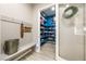 Mudroom leading into pantry with plenty of storage and a cheerful wreath at 4772 Se Argent Hills Ave, Pahrump, NV 89061