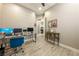 Bright office space with glass desk and tile floors at 4772 Se Argent Hills Ave, Pahrump, NV 89061