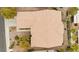 An aerial view of a single story home with a tile roof and desert landscaping at 482 Bonnie Brook Pl, Henderson, NV 89012