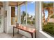 Bay window seating area with view of the outdoors and palm trees at 482 Bonnie Brook Pl, Henderson, NV 89012