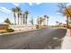 Sun City MacDonald Ranch Community Center entrance with lush landscaping and clear signage at 482 Bonnie Brook Pl, Henderson, NV 89012