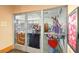 Brightly lit craft room with glass doors displaying quilting and craft projects at 482 Bonnie Brook Pl, Henderson, NV 89012