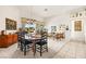 Open-concept dining area with stylish furniture and access to the living space at 482 Bonnie Brook Pl, Henderson, NV 89012