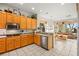 Bright kitchen featuring stainless steel appliances and a cozy breakfast nook at 482 Bonnie Brook Pl, Henderson, NV 89012