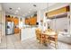 Bright kitchen with stainless steel appliances and adjacent dining area with natural light at 482 Bonnie Brook Pl, Henderson, NV 89012