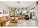 Cozy living area with large windows providing natural light and outdoor views at 482 Bonnie Brook Pl, Henderson, NV 89012